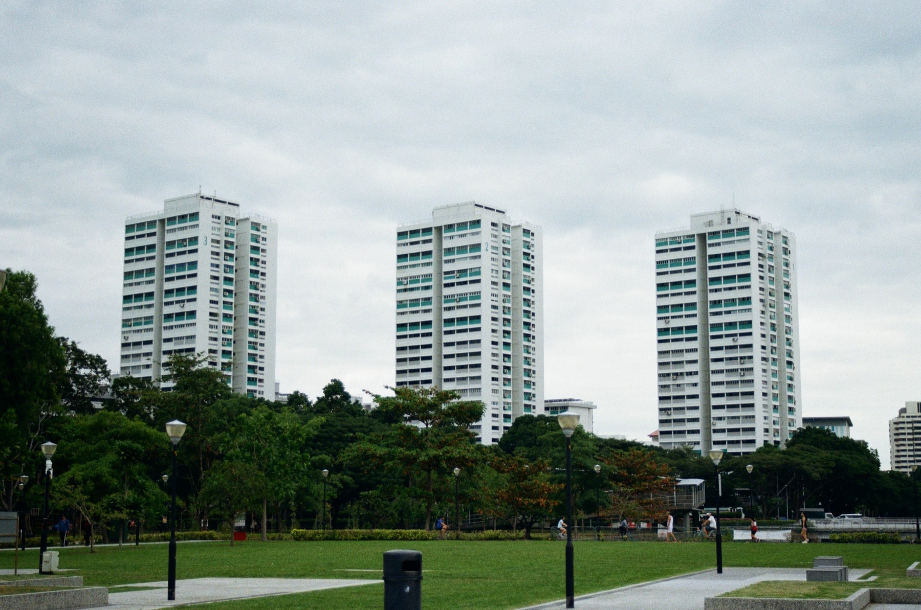 Singapore HDB apartment blocks beside a neighbourhood park, representing the 2026 HDB and EC income ceiling changes