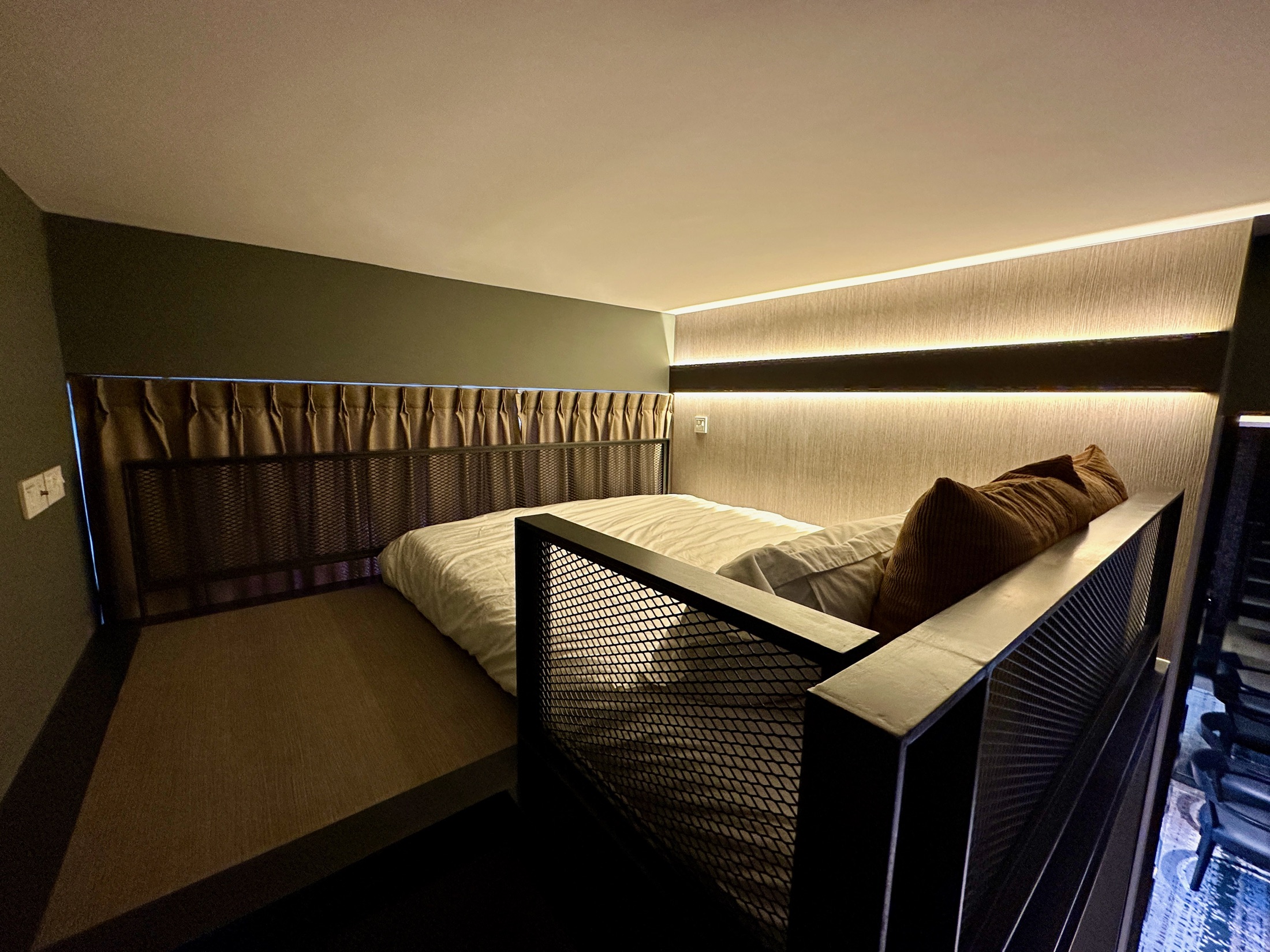 Loft-style sleeping area showing the unique renovated layout at The Siena