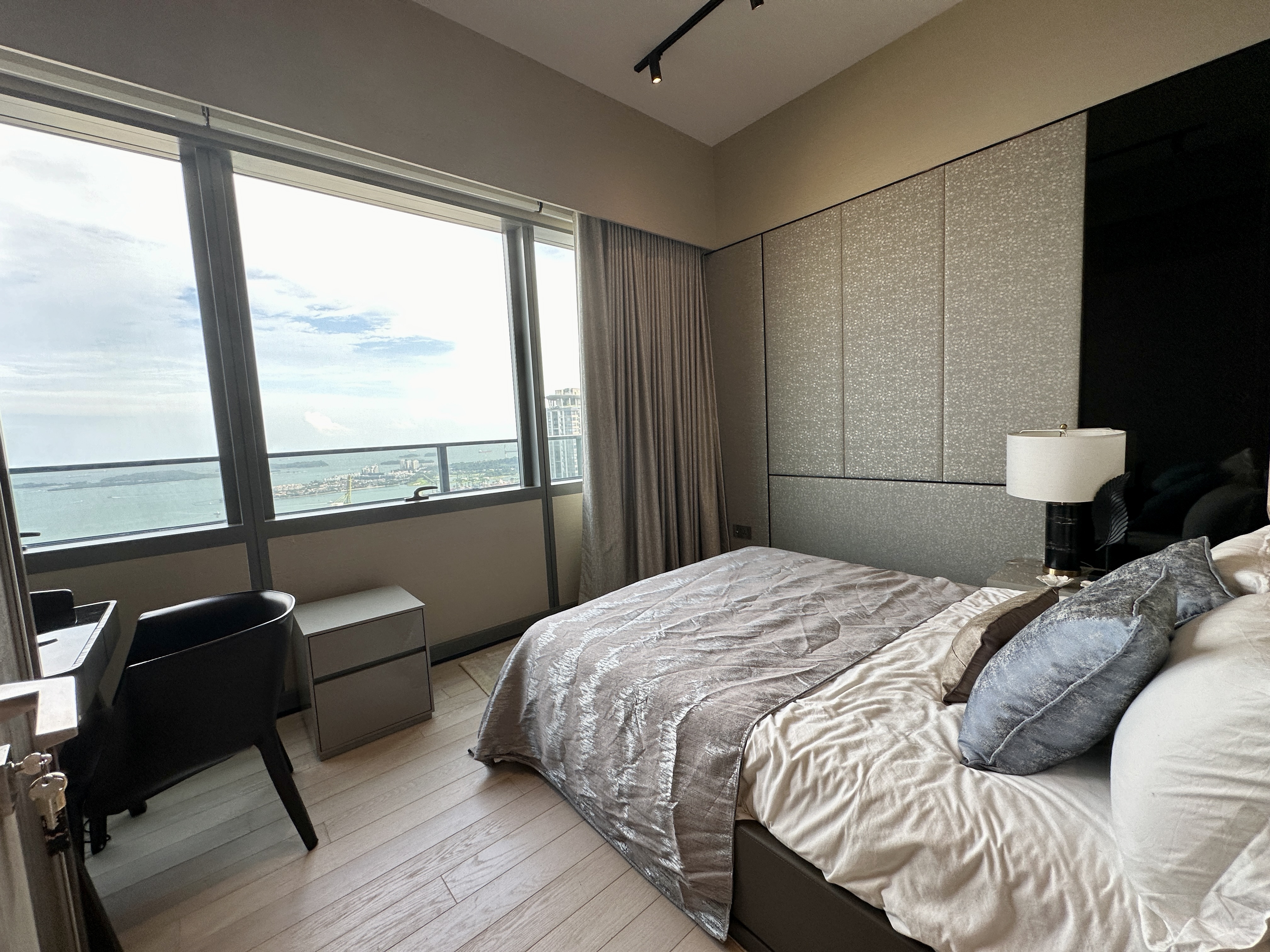 Wallich Residence bedroom with sea view