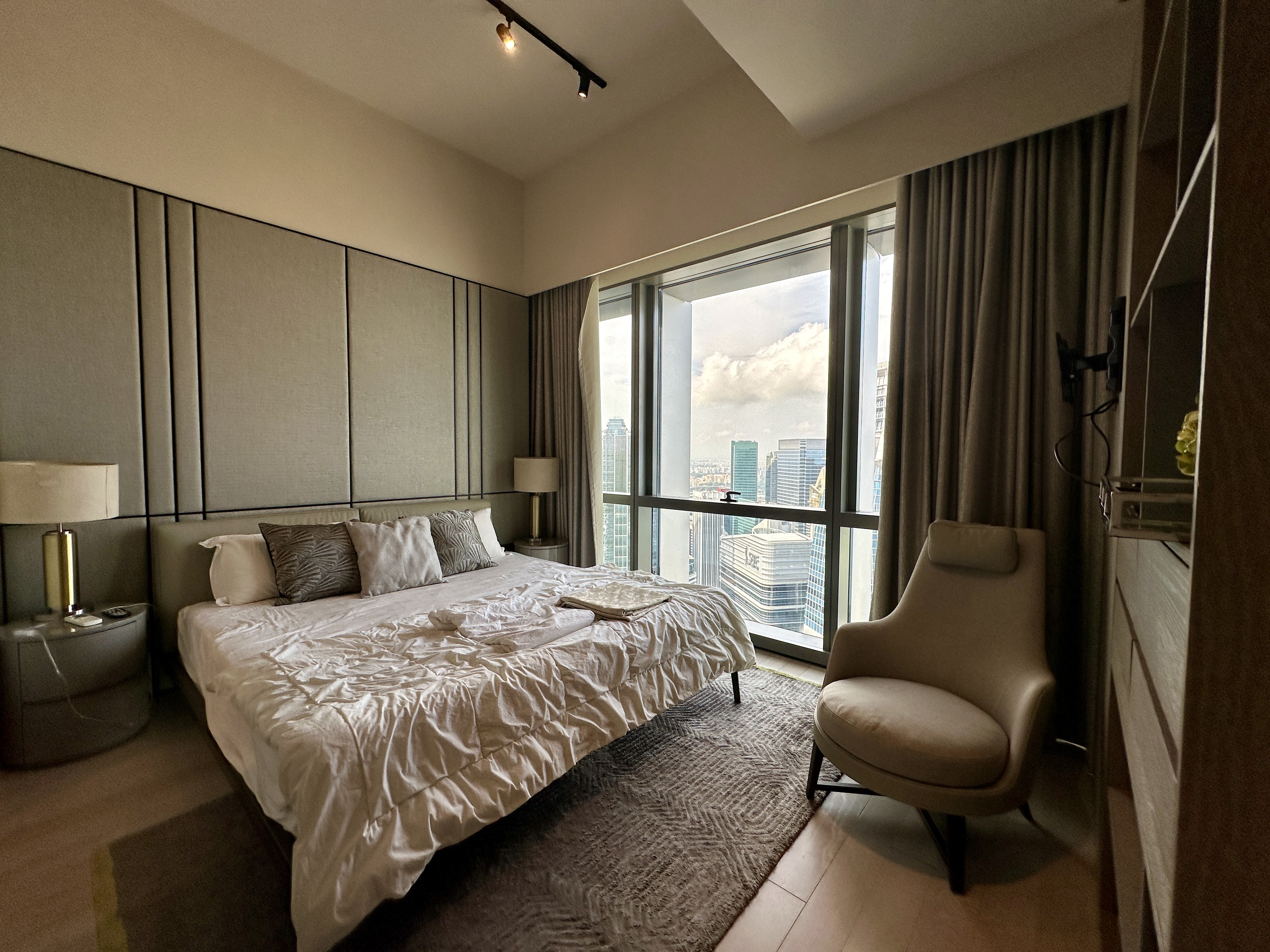 Wallich Residence master bedroom with city view