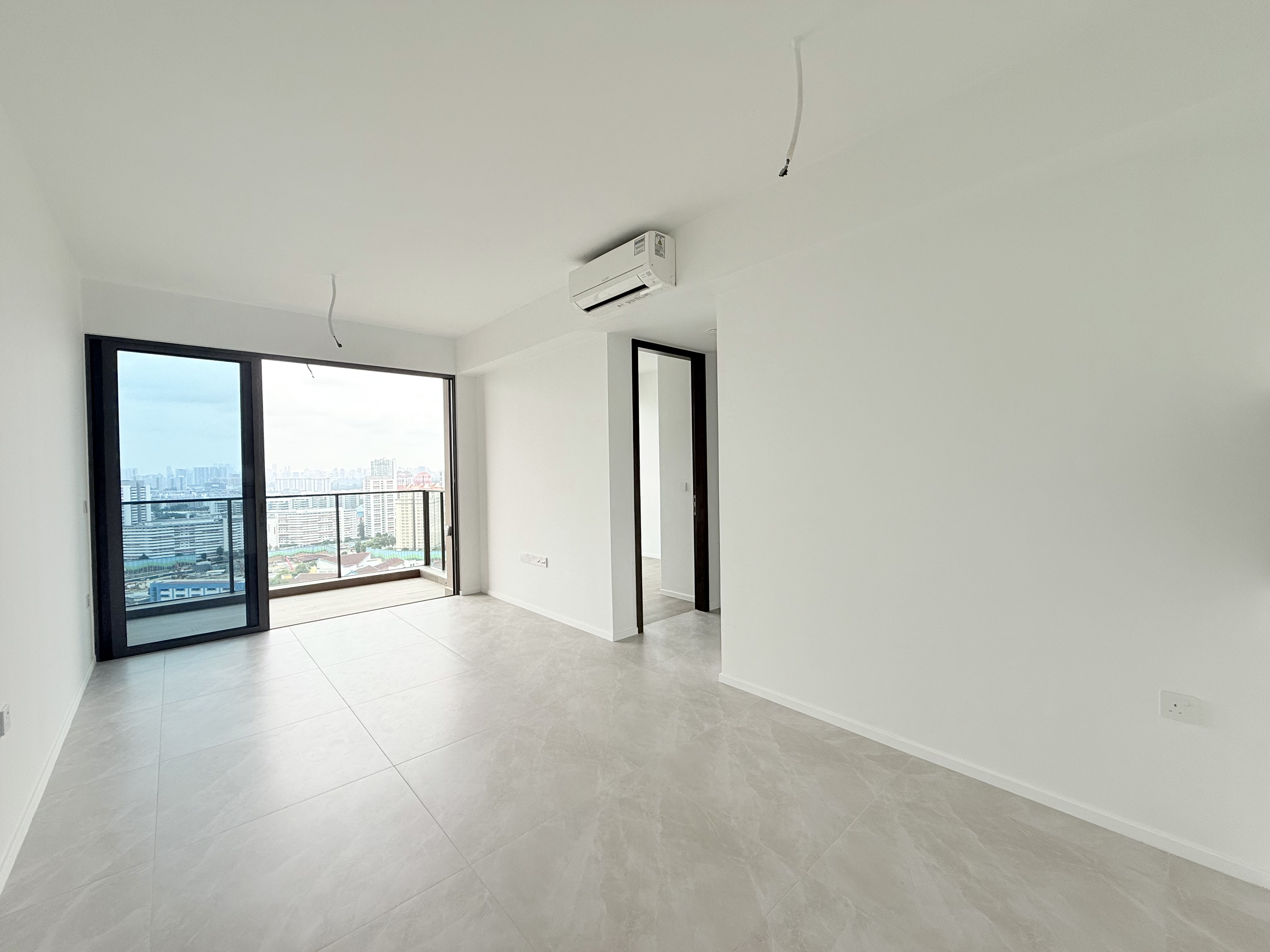 AMO Residence 3-bedroom living and balcony view