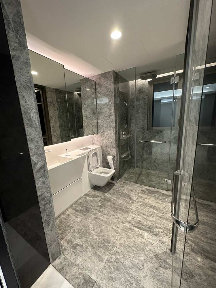Cairnhill Nine bathroom with grey stone finish