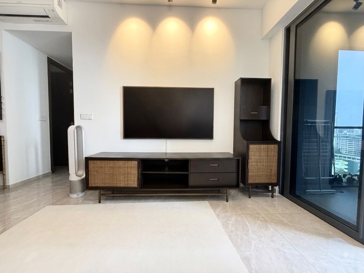 Living room television console and balcony at Parc Clematis